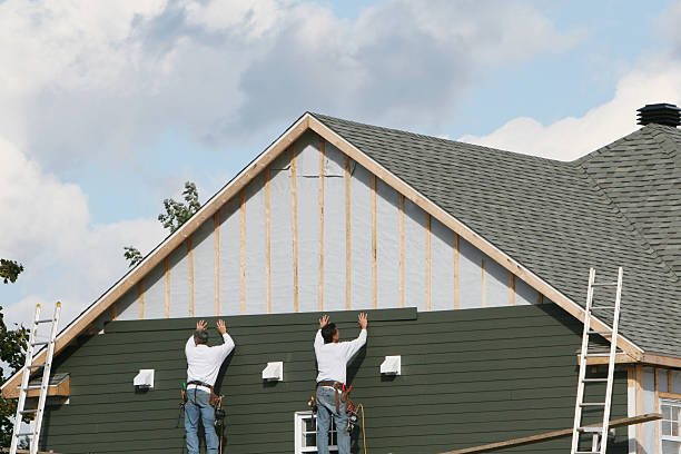 Professional Siding Replacement technician working in New Paris, OH